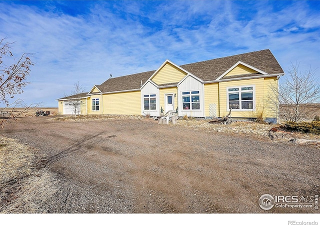 view of front of property featuring a garage