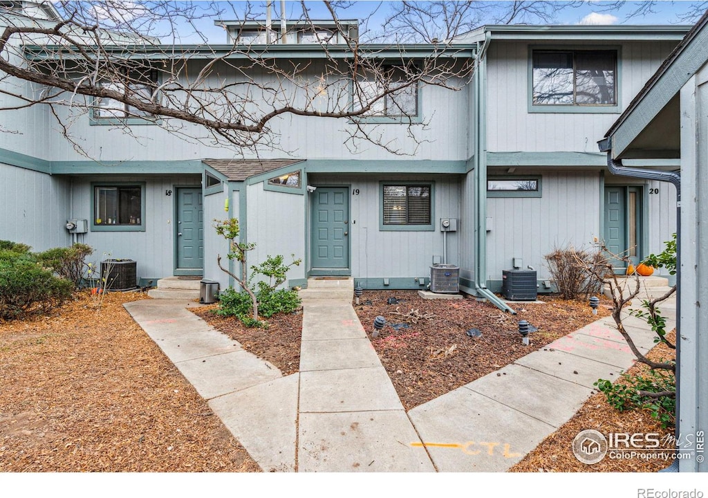 view of property with central AC unit