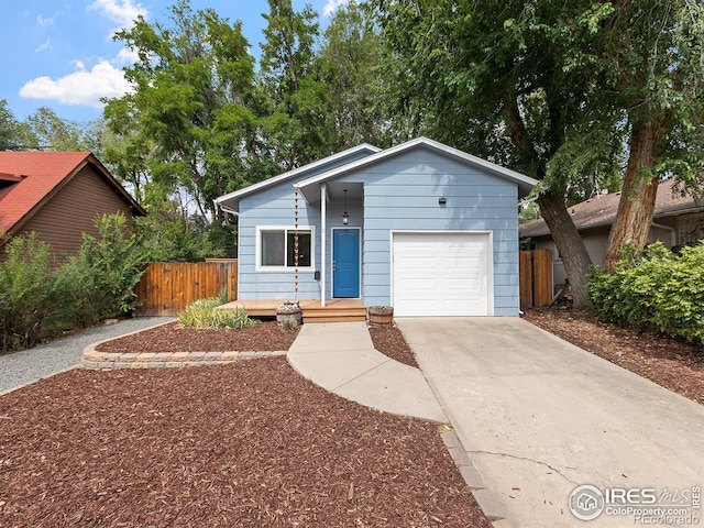 ranch-style home with a garage