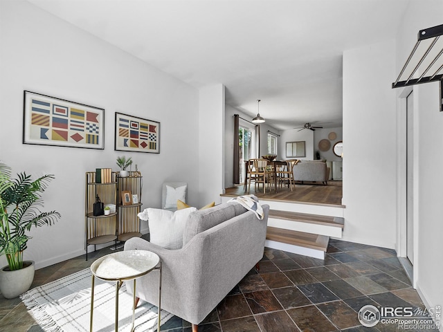 living room with ceiling fan