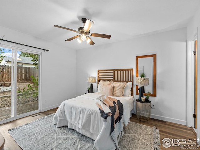 bedroom featuring access to outside, ceiling fan, and hardwood / wood-style flooring