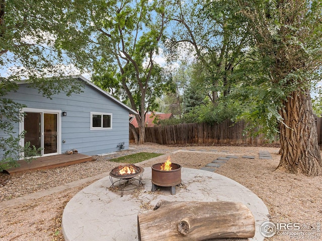 view of patio / terrace with a fire pit