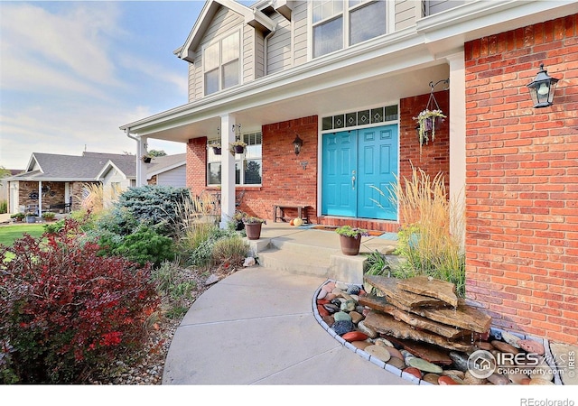 entrance to property with a porch