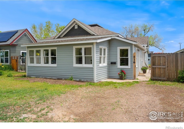 416 Stover St, Fort Collins, CO 80524 - view of front facade with a front lawn