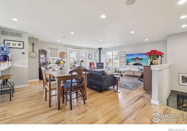 dining room featuring light wood-type flooring