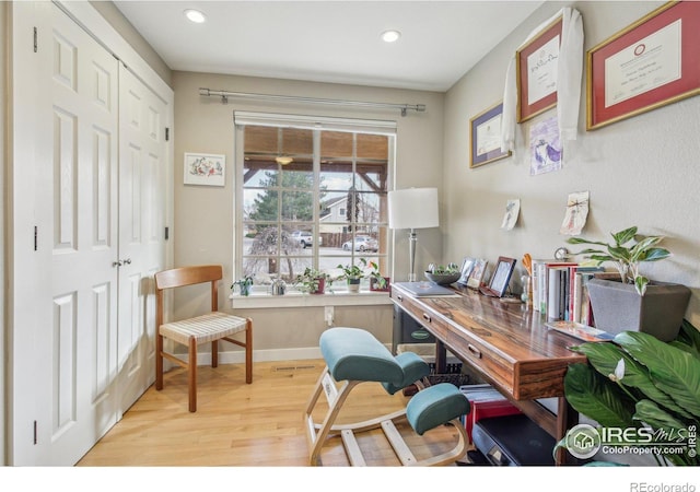 home office featuring light hardwood / wood-style floors