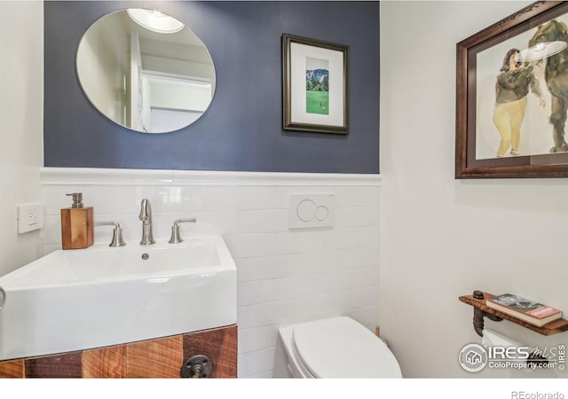 bathroom with sink and toilet