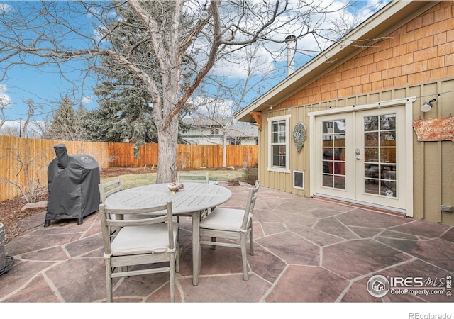 view of patio with grilling area and french doors