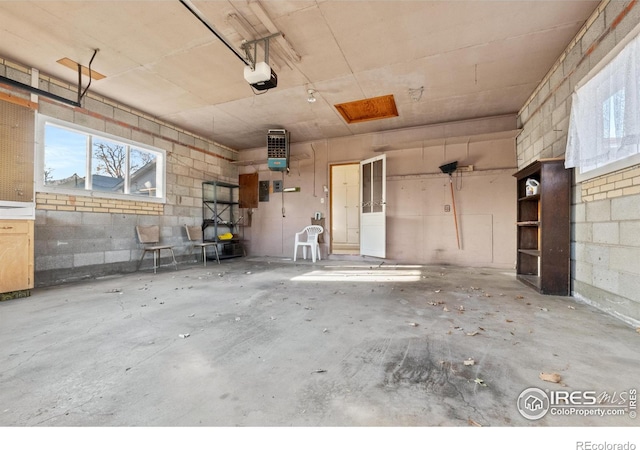 garage featuring a garage door opener