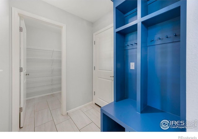 mudroom featuring tile patterned floors