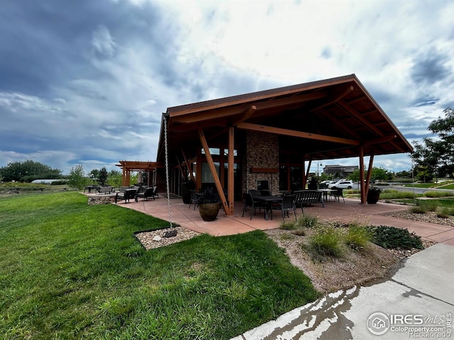 surrounding community with a patio area and a lawn