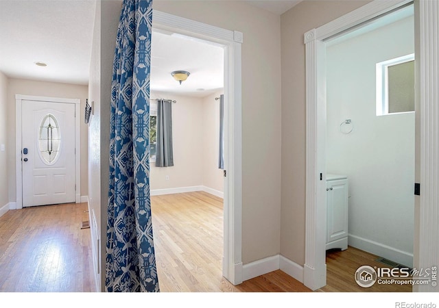 entrance foyer with light hardwood / wood-style floors