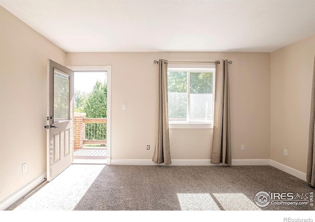 view of carpeted spare room