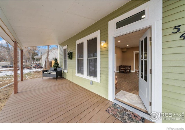 deck with covered porch