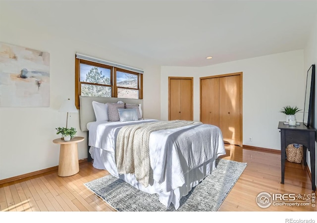 bedroom with light wood-type flooring