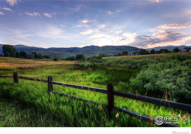 property view of mountains featuring a rural view