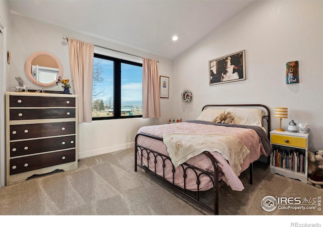 carpeted bedroom featuring lofted ceiling, recessed lighting, and baseboards