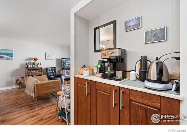 kitchen with dark hardwood / wood-style floors