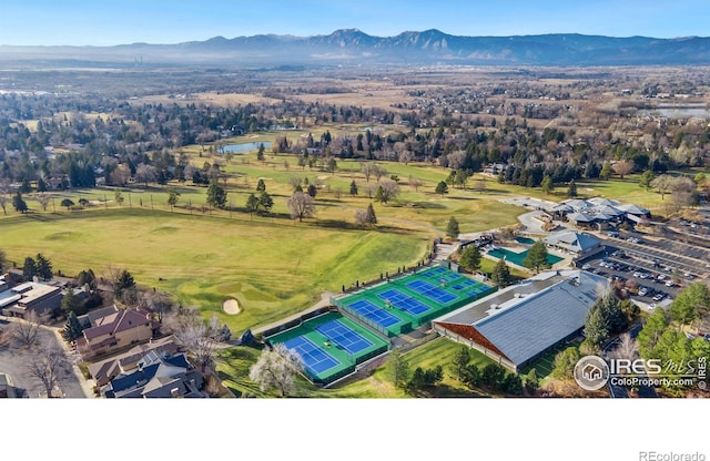 birds eye view of property featuring a mountain view