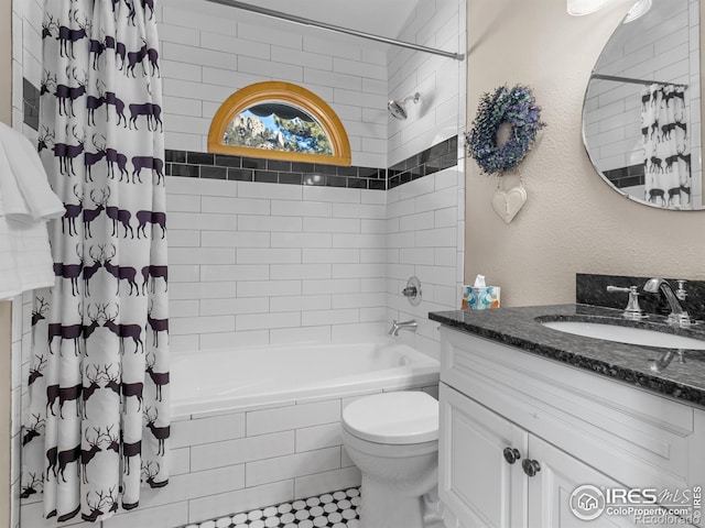 full bathroom with shower / bath combination with curtain, vanity, and toilet