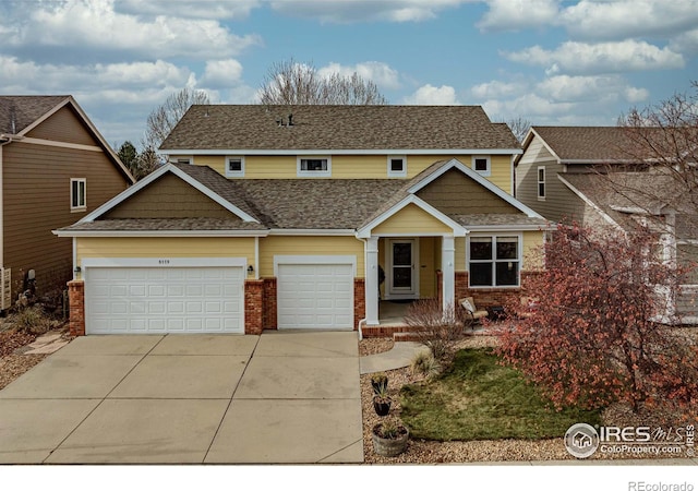 view of front of house featuring a porch and a garage