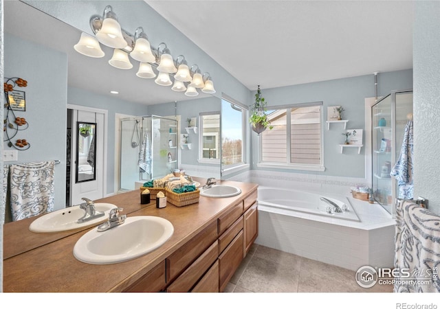 bathroom featuring separate shower and tub, plenty of natural light, vanity, and tile patterned flooring