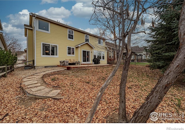 back of house featuring a patio area