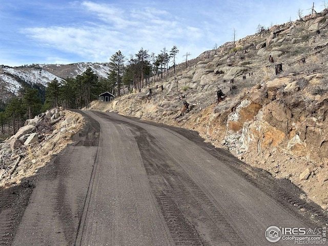 6319 Sunshine Canyon Dr, Boulder, CO 80302 - view of dirt / gravel road featuring a mountain view