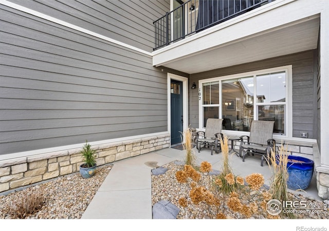 view of patio / terrace with a balcony