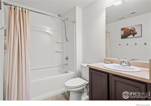 full bathroom with toilet, vanity, and shower / bath combination with curtain