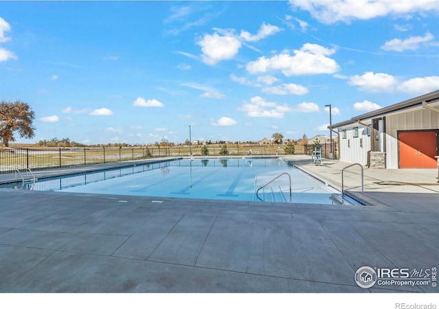 view of pool featuring a patio area