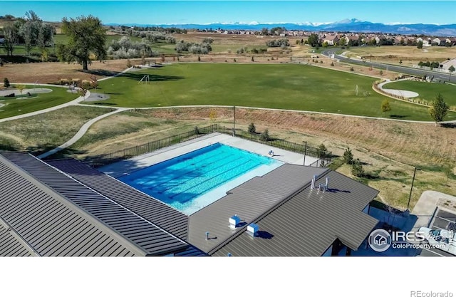 view of pool with a mountain view