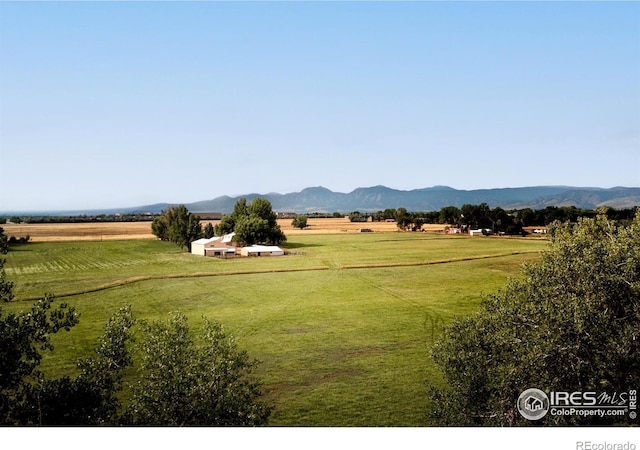 property view of mountains featuring a rural view