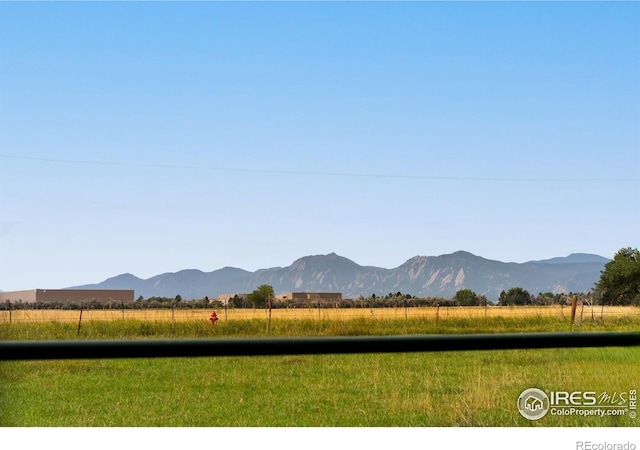 property view of mountains featuring a rural view