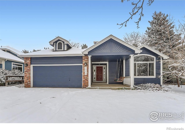 view of front of property featuring a garage