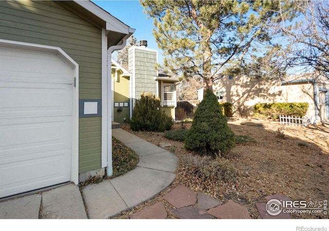 view of yard with a garage