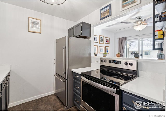 kitchen with stainless steel appliances, gray cabinets, and ceiling fan