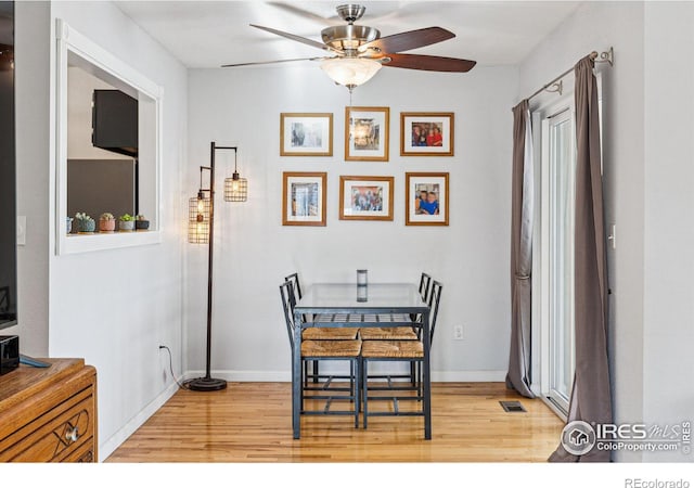 dining area featuring ceiling fan and light hardwood / wood-style floors