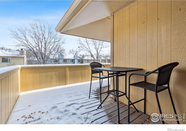 view of snow covered deck