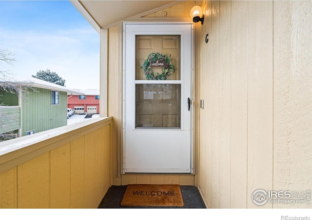 doorway to property with a balcony