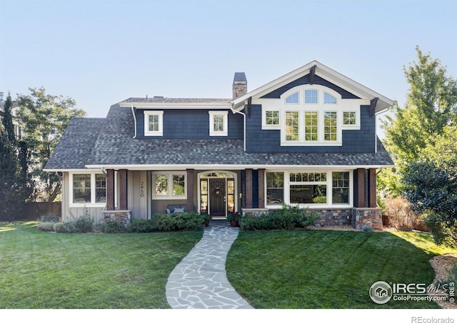 view of front of home with a front yard