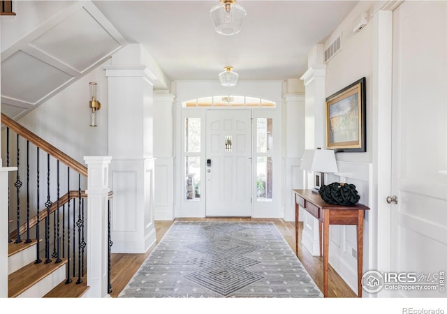 foyer entrance with wood-type flooring