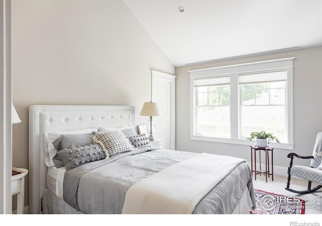 bedroom with vaulted ceiling