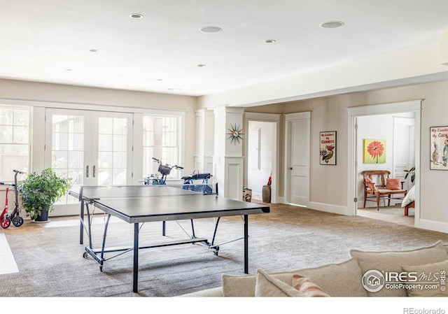 playroom with french doors and light colored carpet