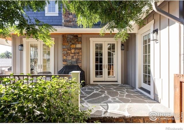 property entrance featuring french doors