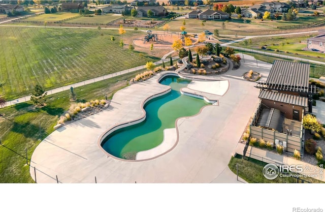 view of pool with a water slide