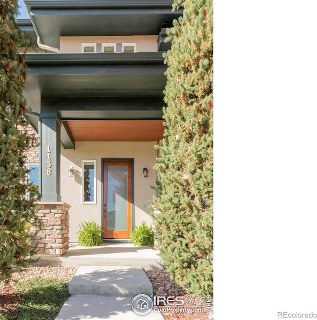 entrance to property with covered porch