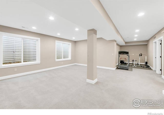 basement with light colored carpet