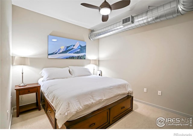 bedroom featuring ceiling fan and light carpet