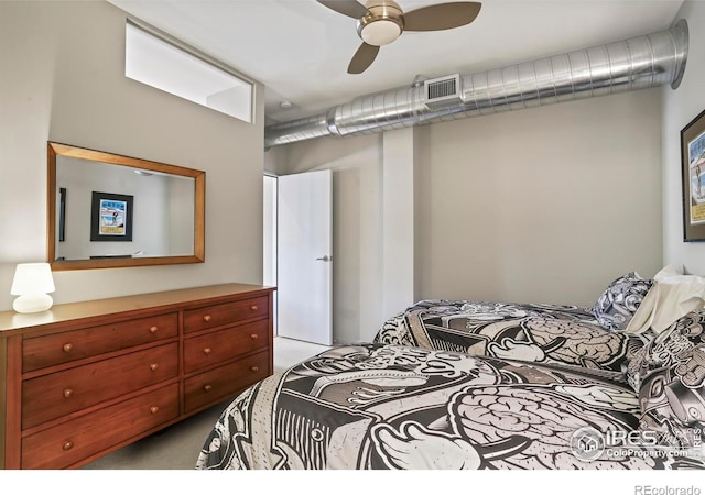 bedroom featuring ceiling fan and light colored carpet